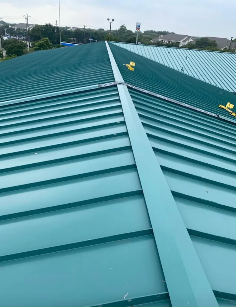 Green commercial metal roof ridge and valley for Metal Roof Repair in Byron